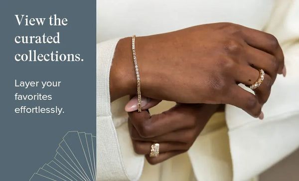 Close-up of hands wearing gold jewelry with a text overlay on a neutral background