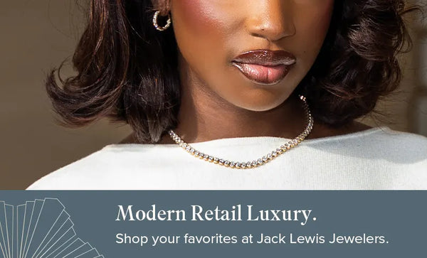 Woman wearing a necklace with text promoting Jack Lewis Jewelers
