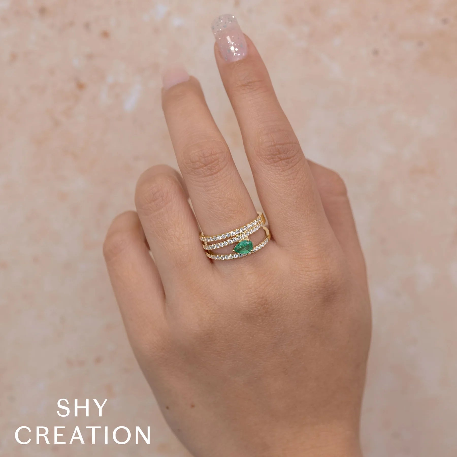 14K YG Pear Shape Emerald & Diamond Cross Over Band