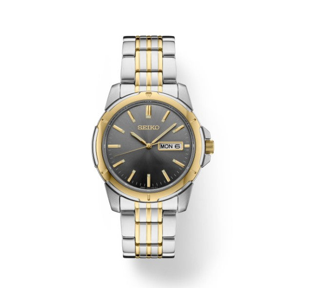 Seiko Essentials Stainless Steel Two-Tone Quartz Gray Dial 

Diameter- 39.6mm
Crystal- Hardlex
Water Resistance- 10 bar, 100M (330ft)
Movement- 6N53