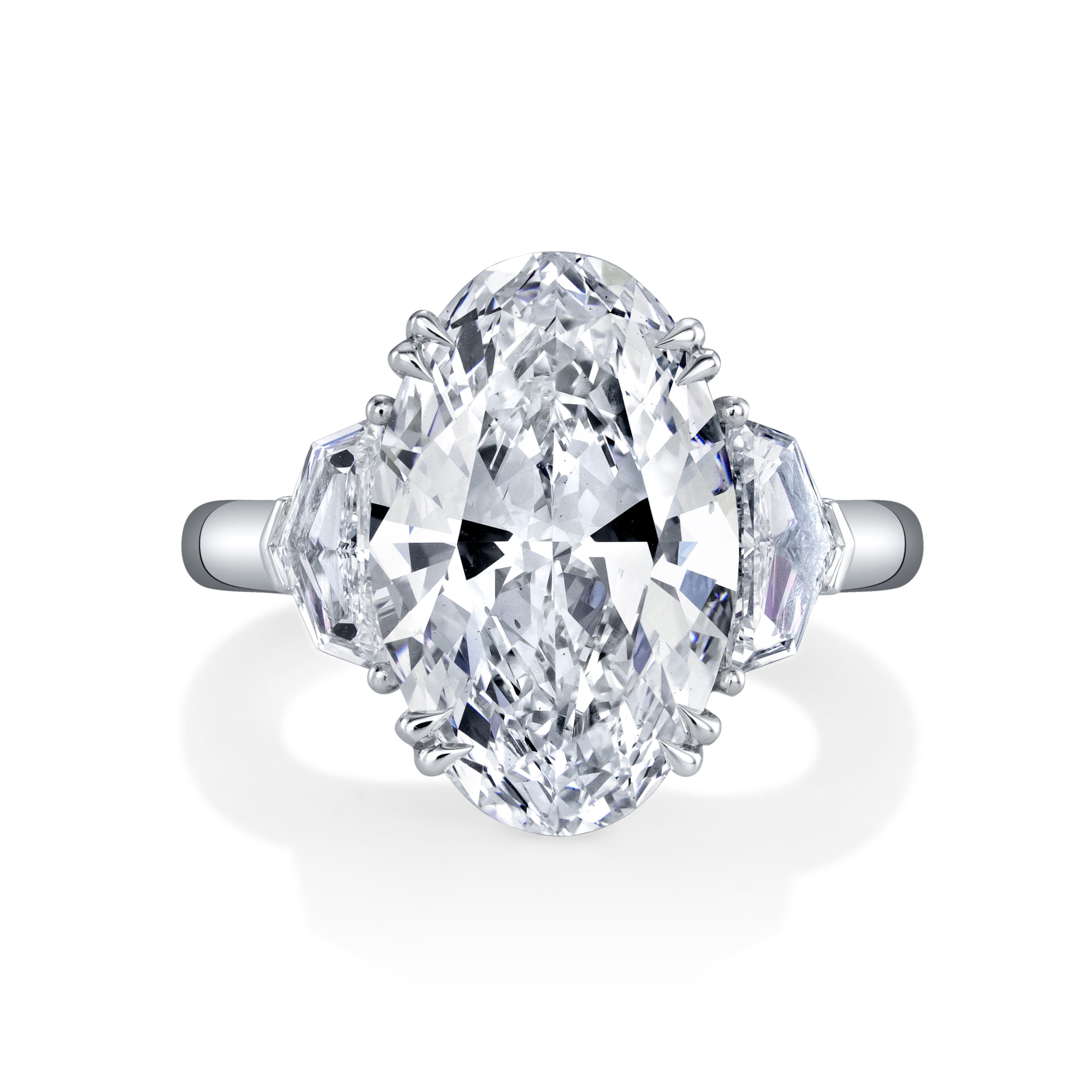 Platinum Oval Diamond Three-Stone Ring with Shield Sides by Joshua J Main image