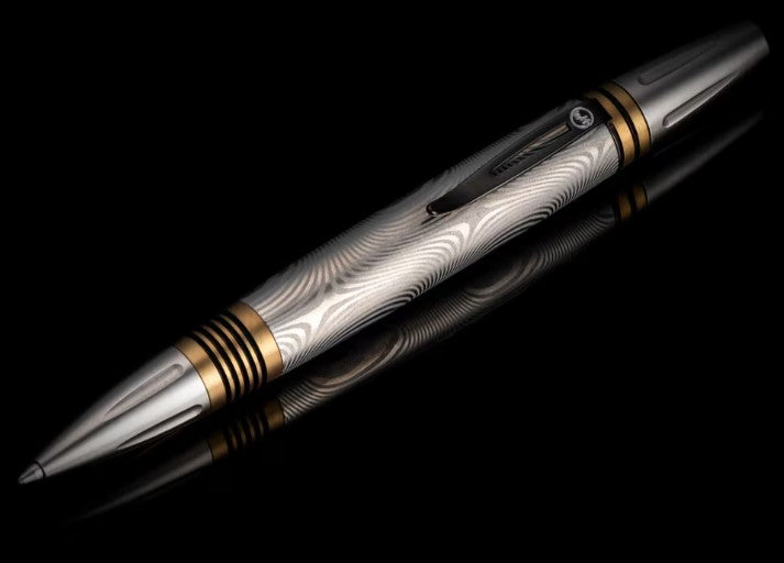 Caribe 16 Twist-action writing pen with damascus steel barrel and brass details by William Henry Main image