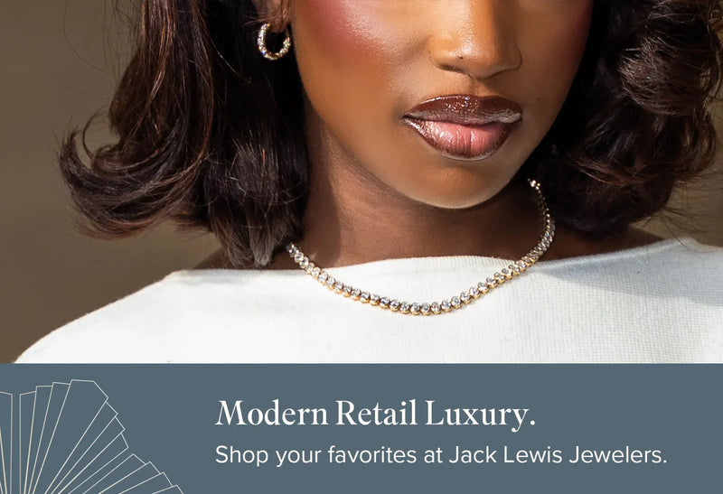 Woman wearing a gold necklace with a neutral background and promotional text for Jack Lewis Jewelers.