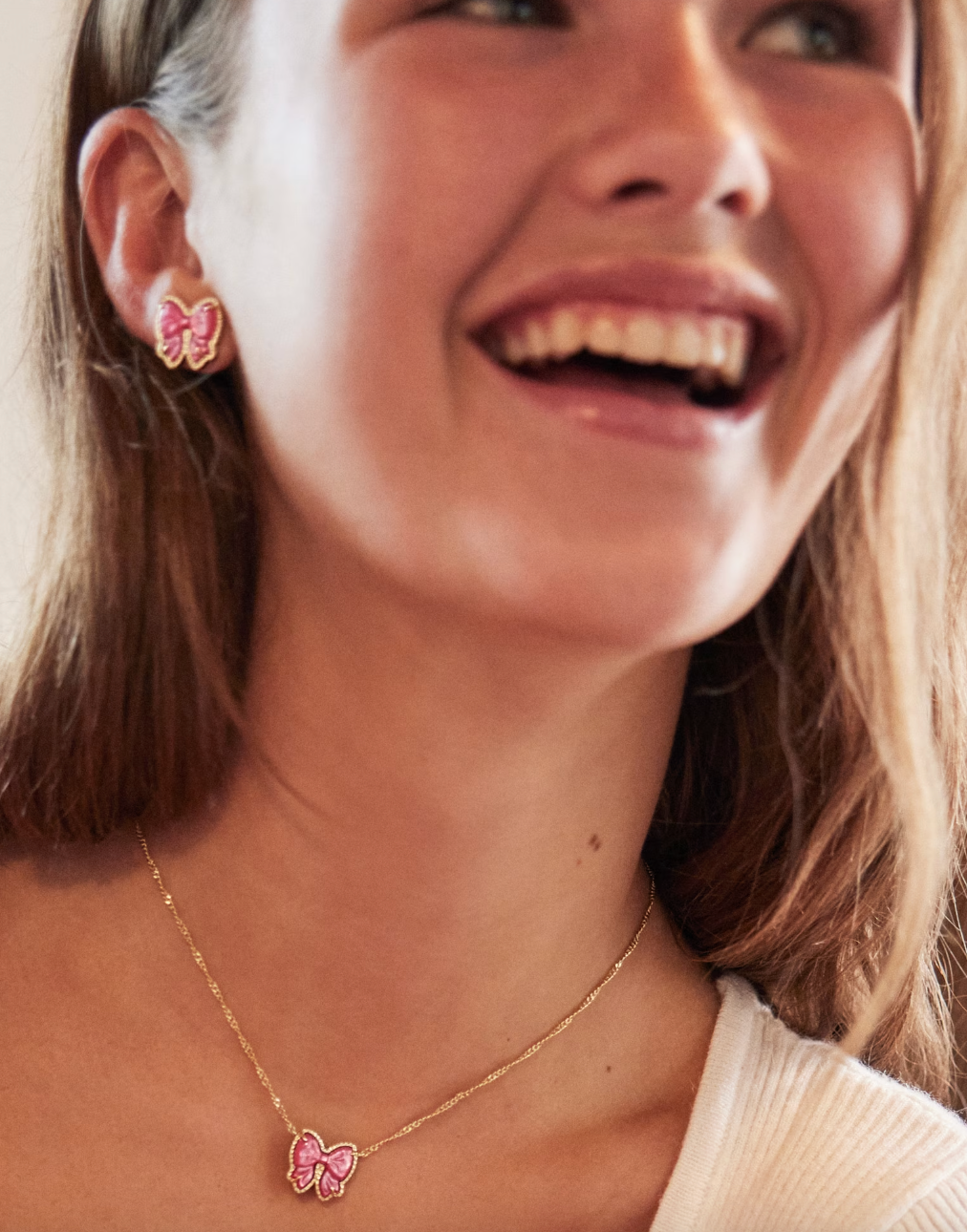 Gold Plated Haley Bow Stud Earrings in Rose Violet MOP by Kendra Scott