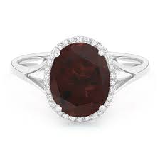 14K WG Oval Garnet & Diamond Halo Ring by Madison L Main image